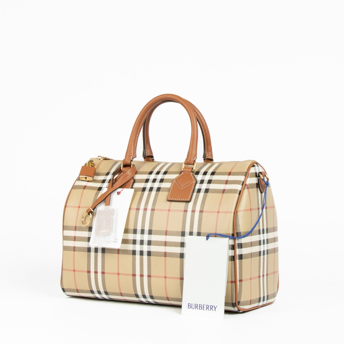 Authentic pre-loved Burberry Beige Canvas Medium Bowling Top Handle Bag on Labellov.com