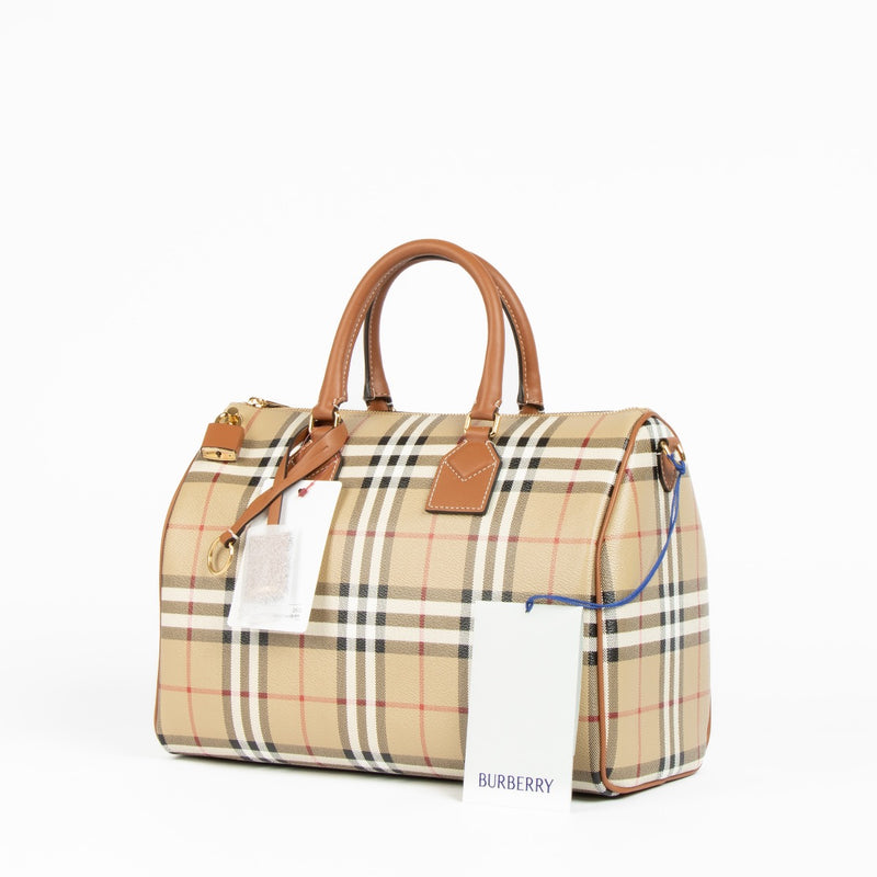 Authentic pre-loved Burberry Beige Canvas Medium Bowling Top Handle Bag on Labellov.com