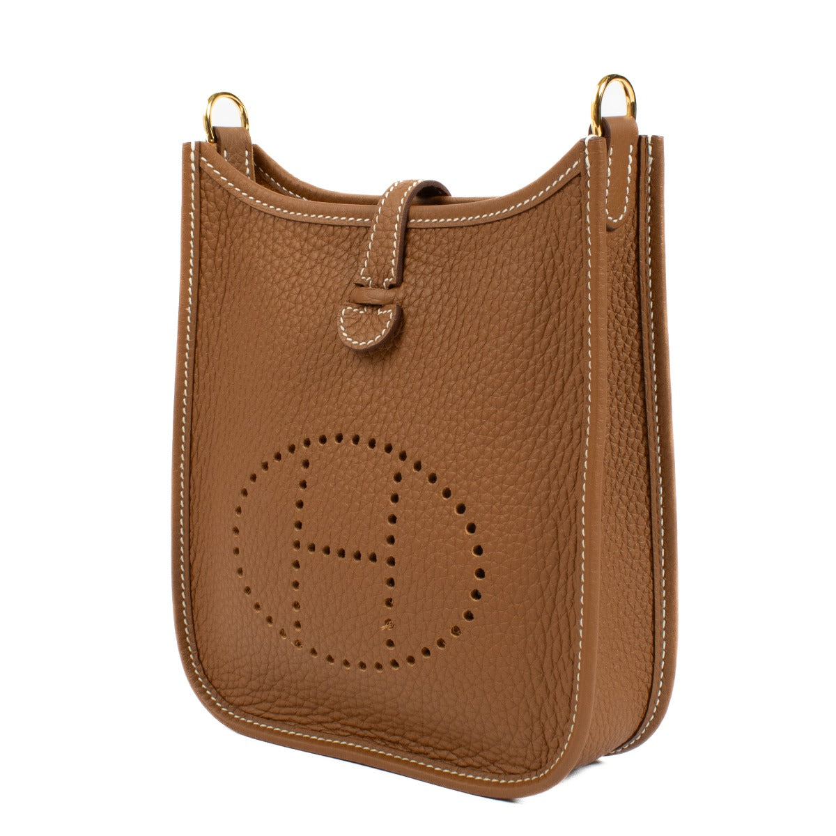 Discover the Hermès Evelyne bag at Labellov, featuring a minimalist design and iconic perforated H.