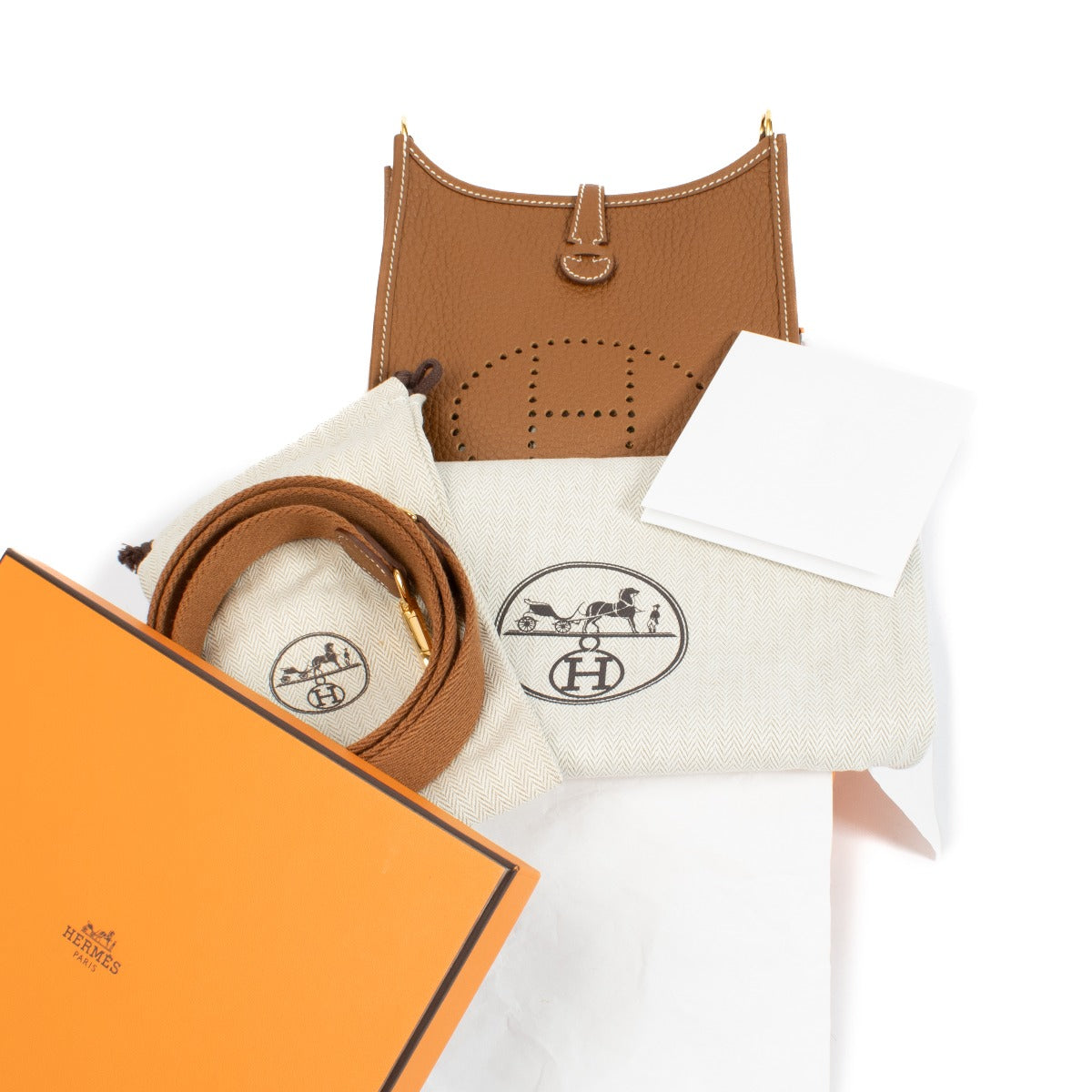 Discover the Hermès Evelyne bag at Labellov, featuring a minimalist design and iconic perforated H.