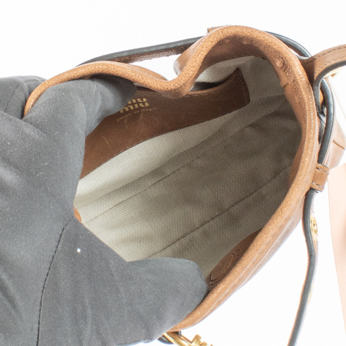 Authentic Preloved Miu Miu Aventure Brown Pouch Bag Crossbody on Labellov.com