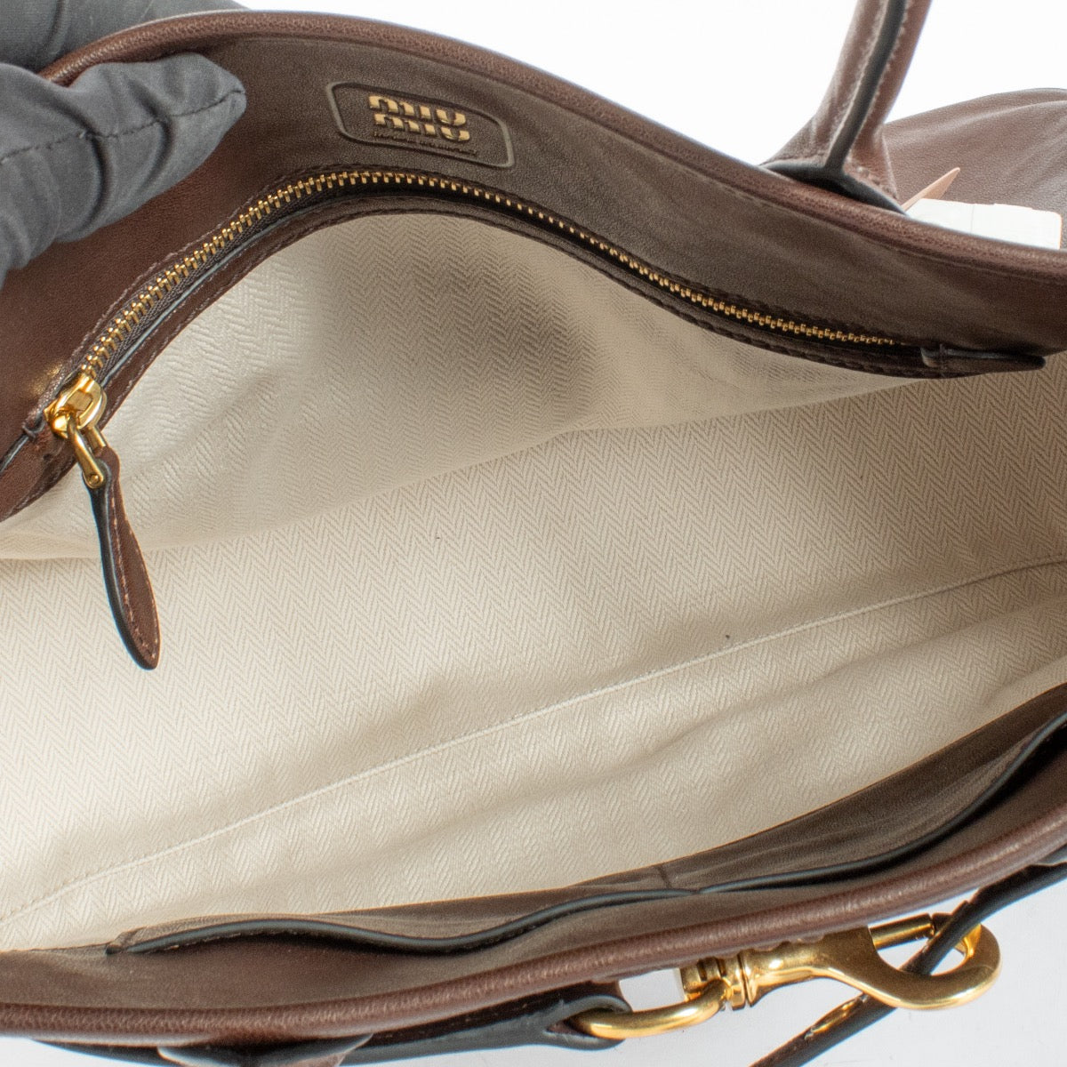 Authentic Preloved Miu Miu Brown Adventure Bag Top Handle on Labellov.com