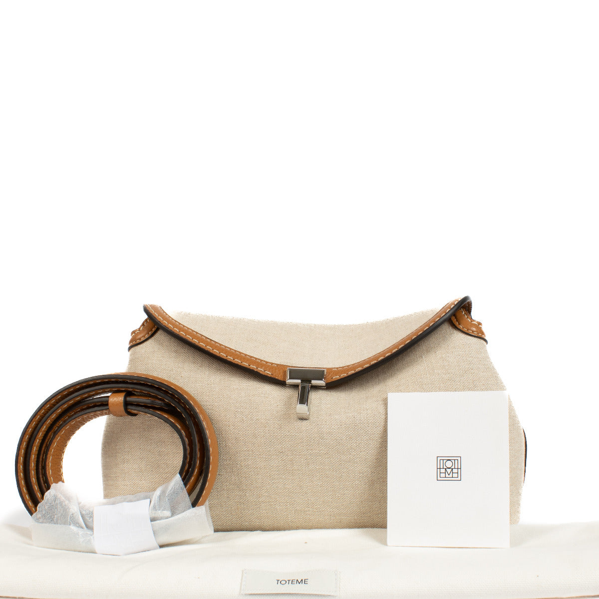 Totême Canvas and Cognac T-Lock Clutch
