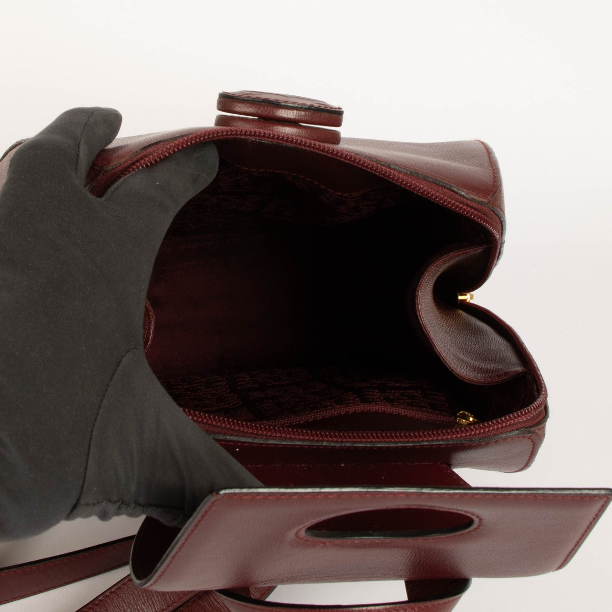 Shop this 100% authentic Cartier Burgundy Leather Backpack at Labellov.com