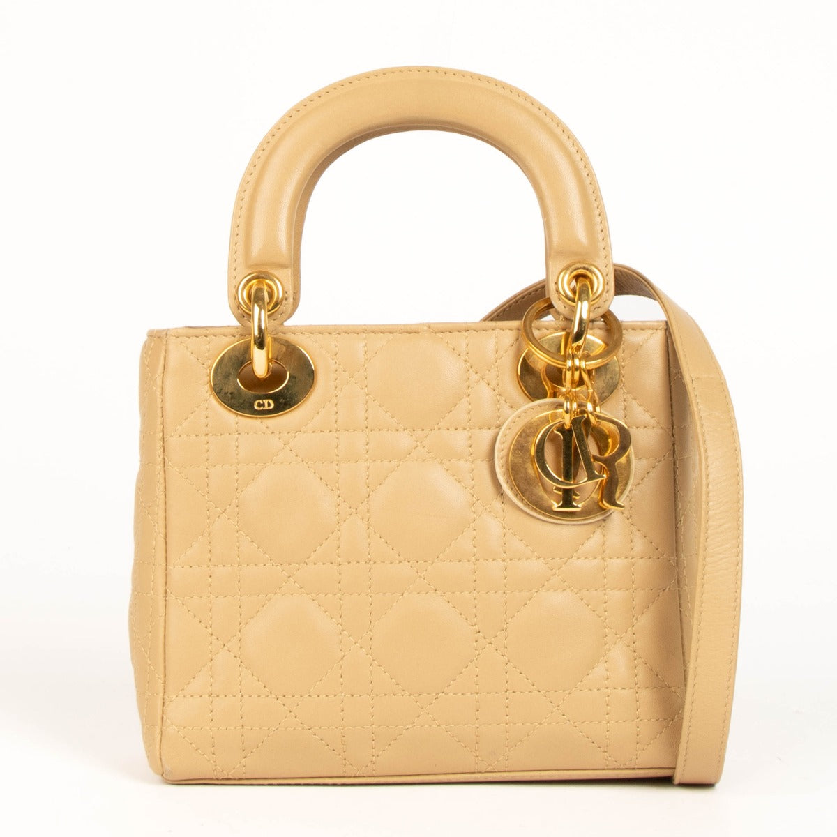 Shop this authentic Christian Dior Vintage Beige Mini Lady Dior pre-loved on Labellov.com