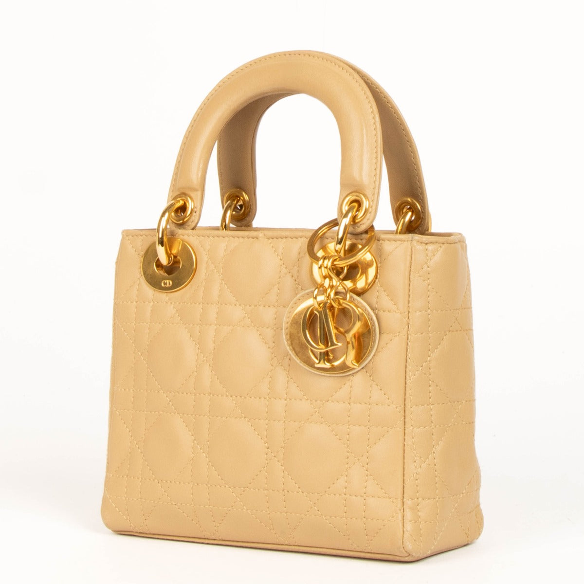 Shop this authentic Christian Dior Vintage Beige Mini Lady Dior pre-loved on Labellov.com