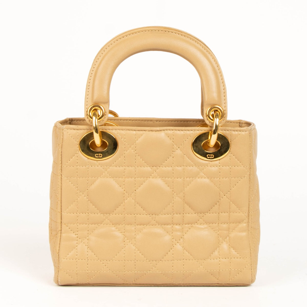Shop this authentic Christian Dior Vintage Beige Mini Lady Dior pre-loved on Labellov.com