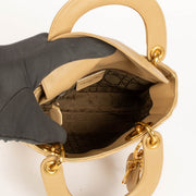 Shop this authentic Christian Dior Vintage Beige Mini Lady Dior pre-loved on Labellov.com