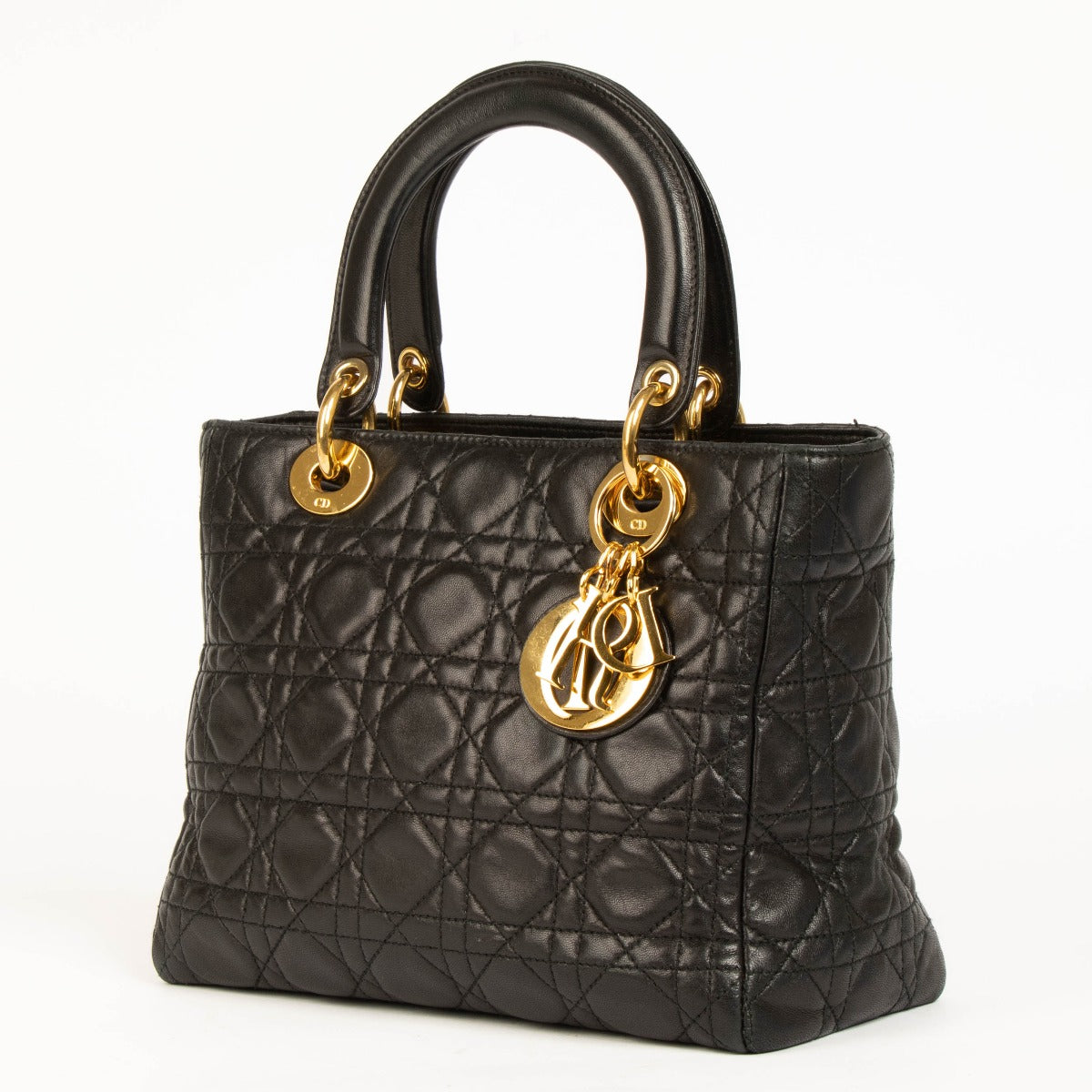 Shop this 100% authentic Christian Dior Vintage Black Medium Lady Dior Bag at Labellov.com