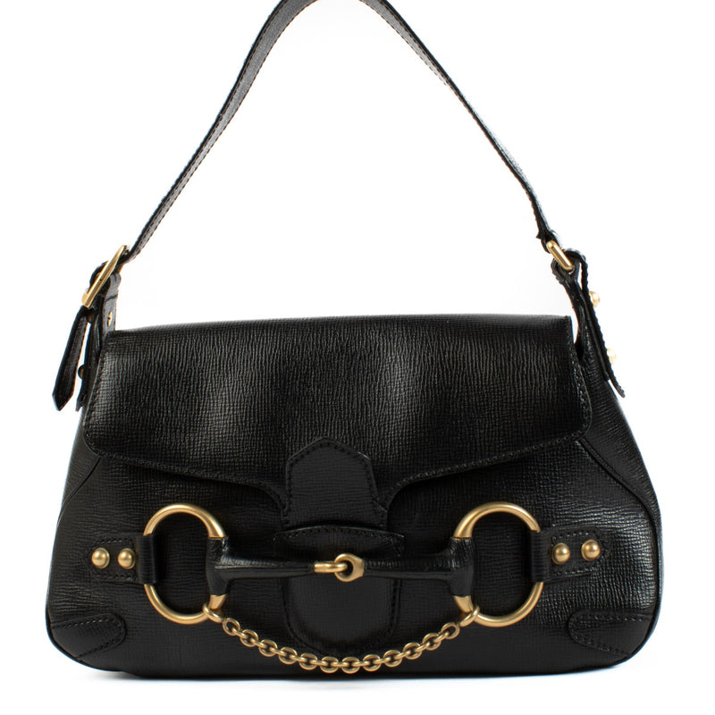 Gucci Black Horsebit Shoulder Bag in premium black leather, featuring the iconic Horsebit detail and an adjustable shoulder strap for versatile wear. Buy now on Labellov.