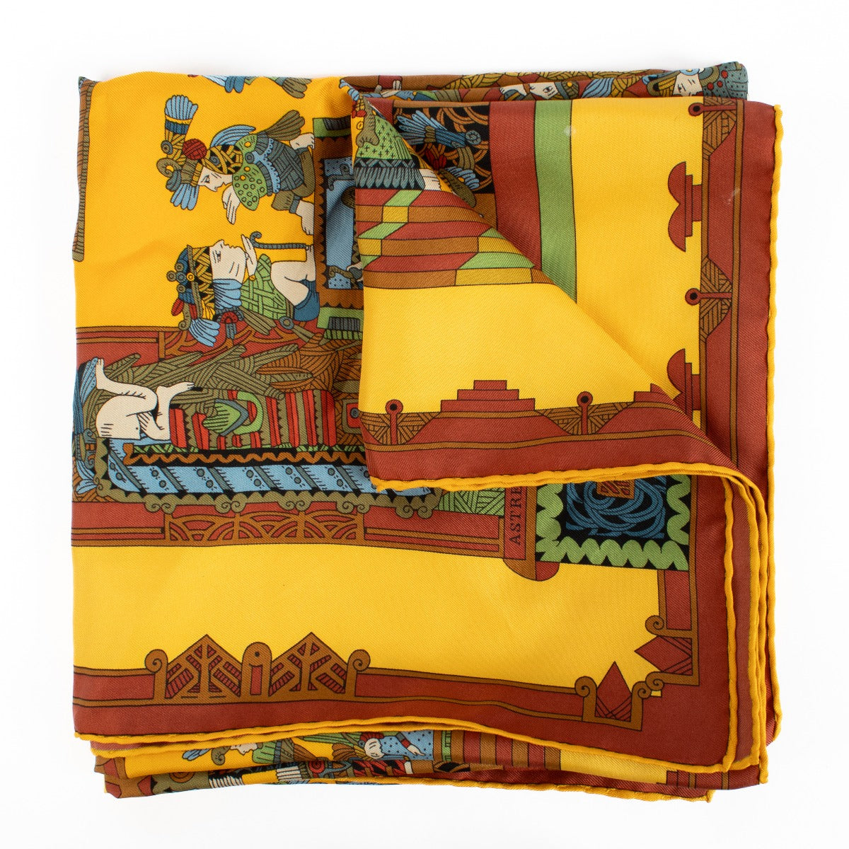 Vibrant Hermès multicolor 90 silk scarf featuring bold yellow, red, blue, and green hues with the brand's iconic patterns. Buy now on Labellov.