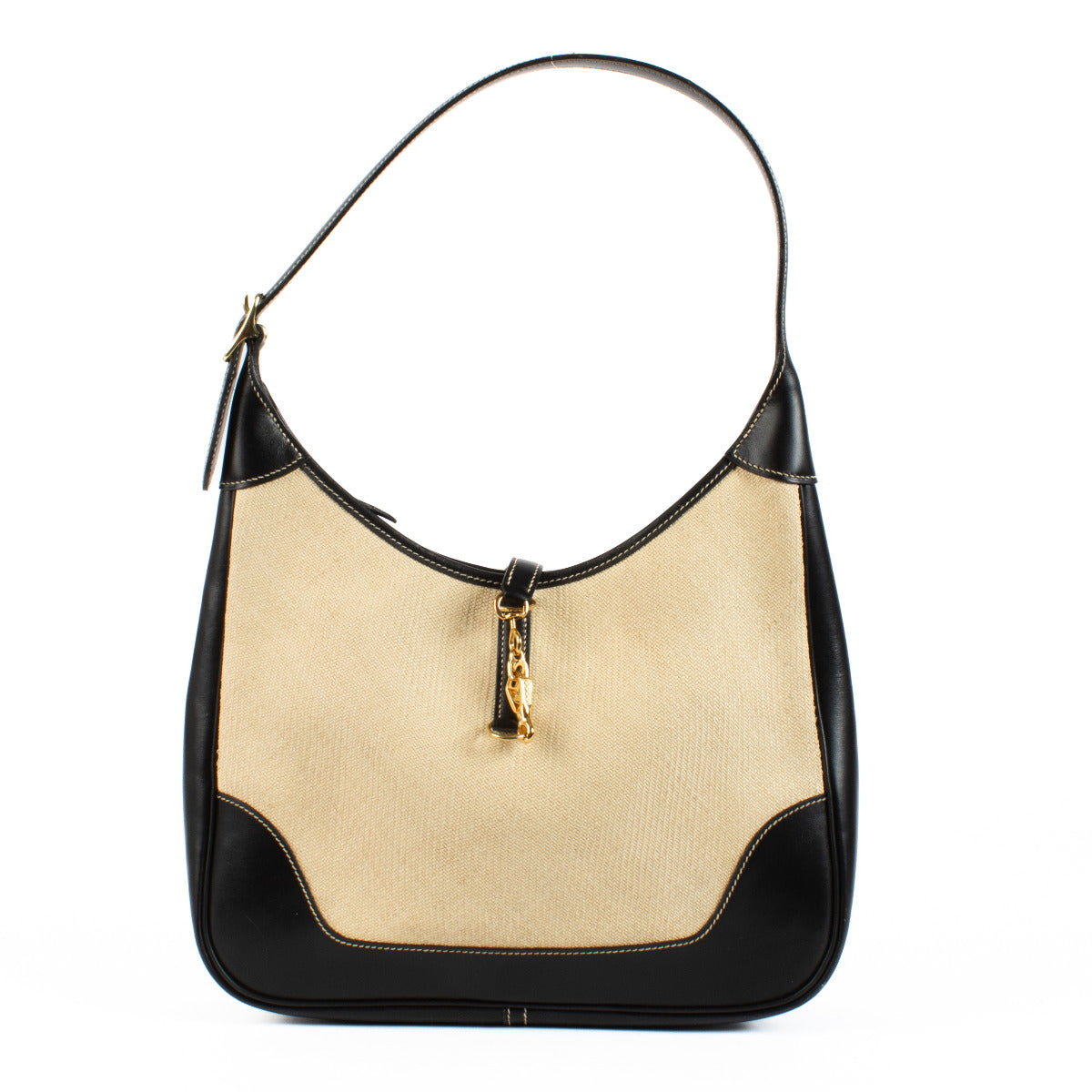 Hermès Trim 31 Black Leather and Toile Shoulder Bag aan de beste prijs bij Labellov tweedehands luxe in Antwerpen en Knokke. We buy and sell your preloved and new designer bags for the best price.