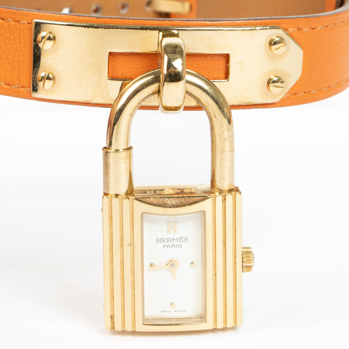 Shop this 100% authentic Hermès Gold Kelly Watch with orange strap at Labellov.com