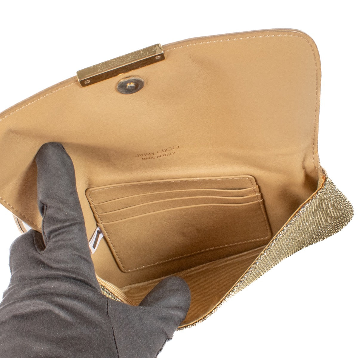 Shop safe online at Labellov in Antwerp, Brussels and Knokke this 100% authentic second hand Jimmy Choo Gold Glitter Zeta Clutch. Veilig online een authentiek tweedehands Jimmy Choo Gold Glitter Zeta Clutch kopen bij Labellov.