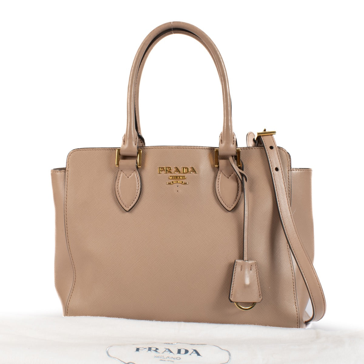 Shop safe online at Labellov in Antwerp, Brussels and Knokke this 100% authentic second hand Prada Beige Saffiano Top Handle Bag.