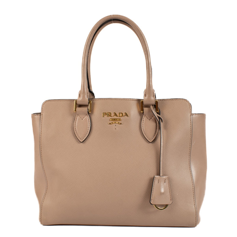 Shop safe online at Labellov in Antwerp, Brussels and Knokke this 100% authentic second hand Prada Beige Saffiano Top Handle Bag.