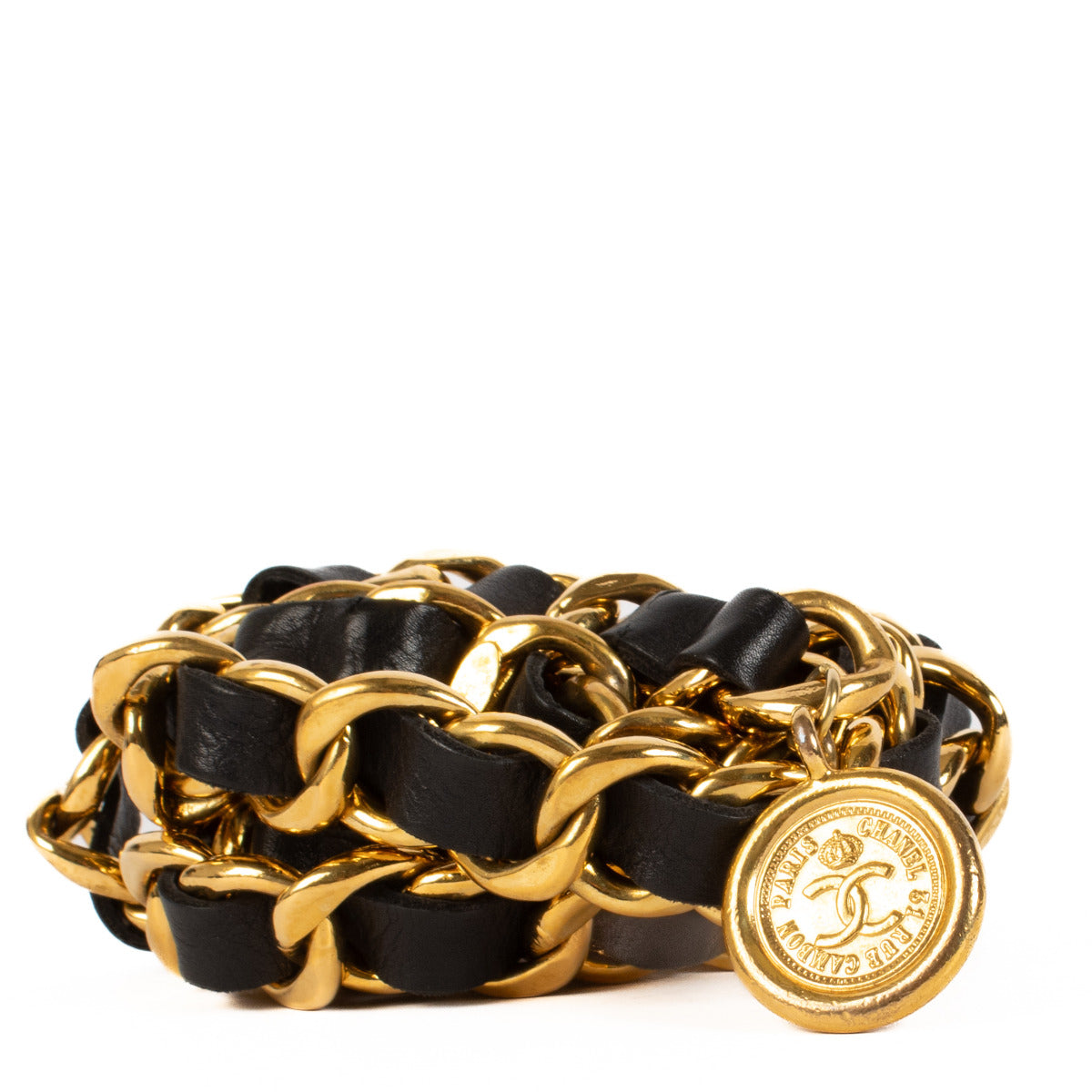 Ceinture Chanel noire et chaîne dorée