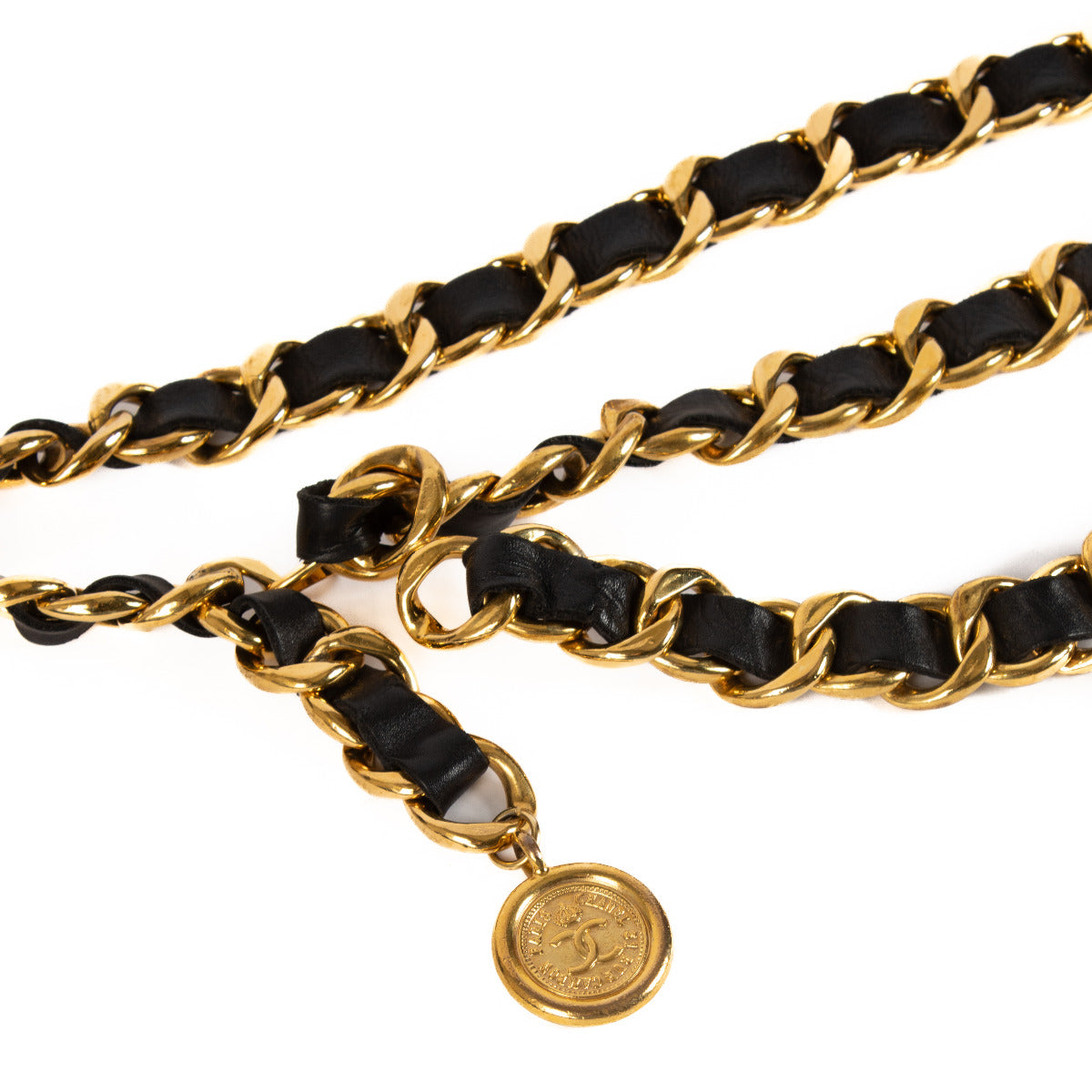 Ceinture Chanel noire et chaîne dorée