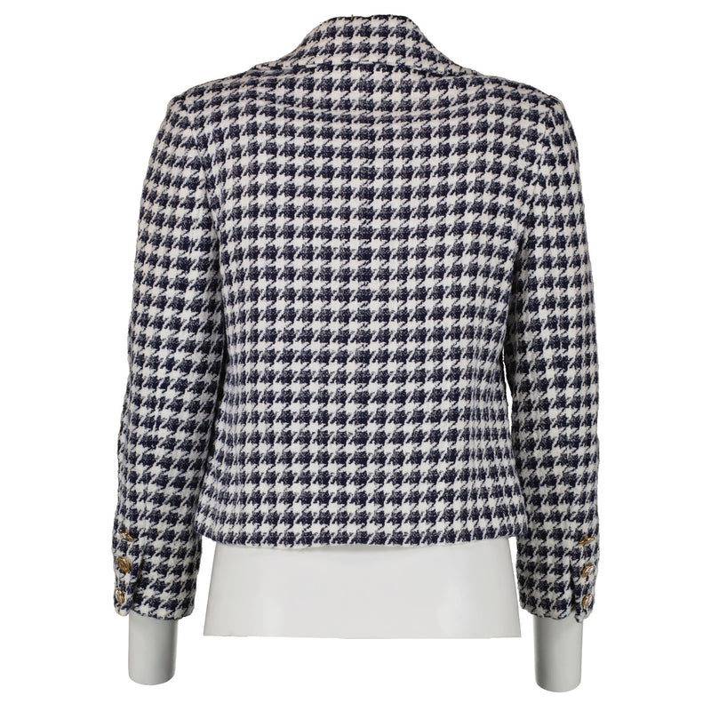 Shop safe online at Labellov in Antwerp, Brussels and Knokke this 100% authentic second hand Chanel Vintage Collection 16 Houndstooth Tweed Jacket. Veilig online tweedehands Chanel tweed vest kopen bij Labellov.