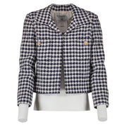 Shop safe online at Labellov in Antwerp, Brussels and Knokke this 100% authentic second hand Chanel Vintage Collection 16 Houndstooth Tweed Jacket. Veilig online tweedehands Chanel tweed vest kopen bij Labellov.