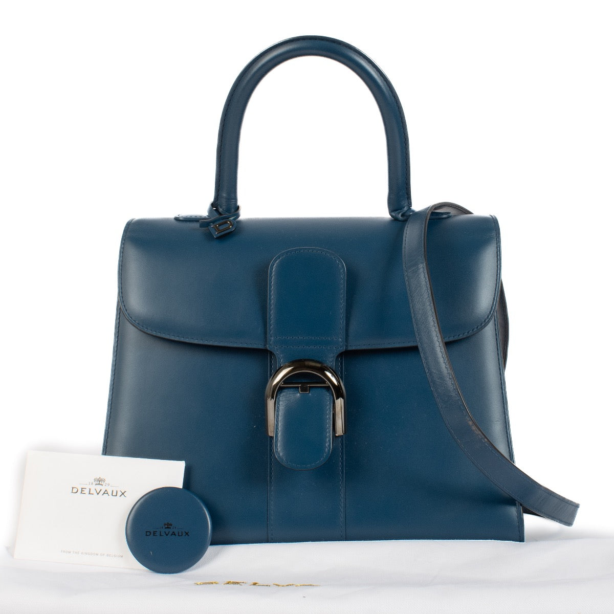 Shop safe online at Labellov in Antwerp, Brussels and Knokke this 100% authentic second hand Delvaux Bleu de Prusse Box Calf Brillant MM + Strap. Veilig online authentieke tweedehands Delvaux Brillant MM kopen bij Labellov.