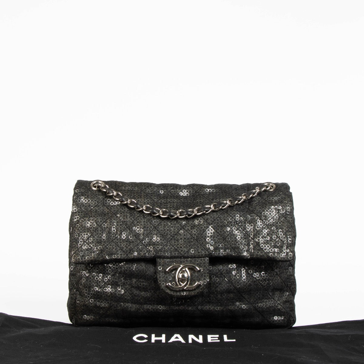 Shop this authentic Chanel Black Sequin Mesh Large Flap Bag pre-loved on Labellov.com