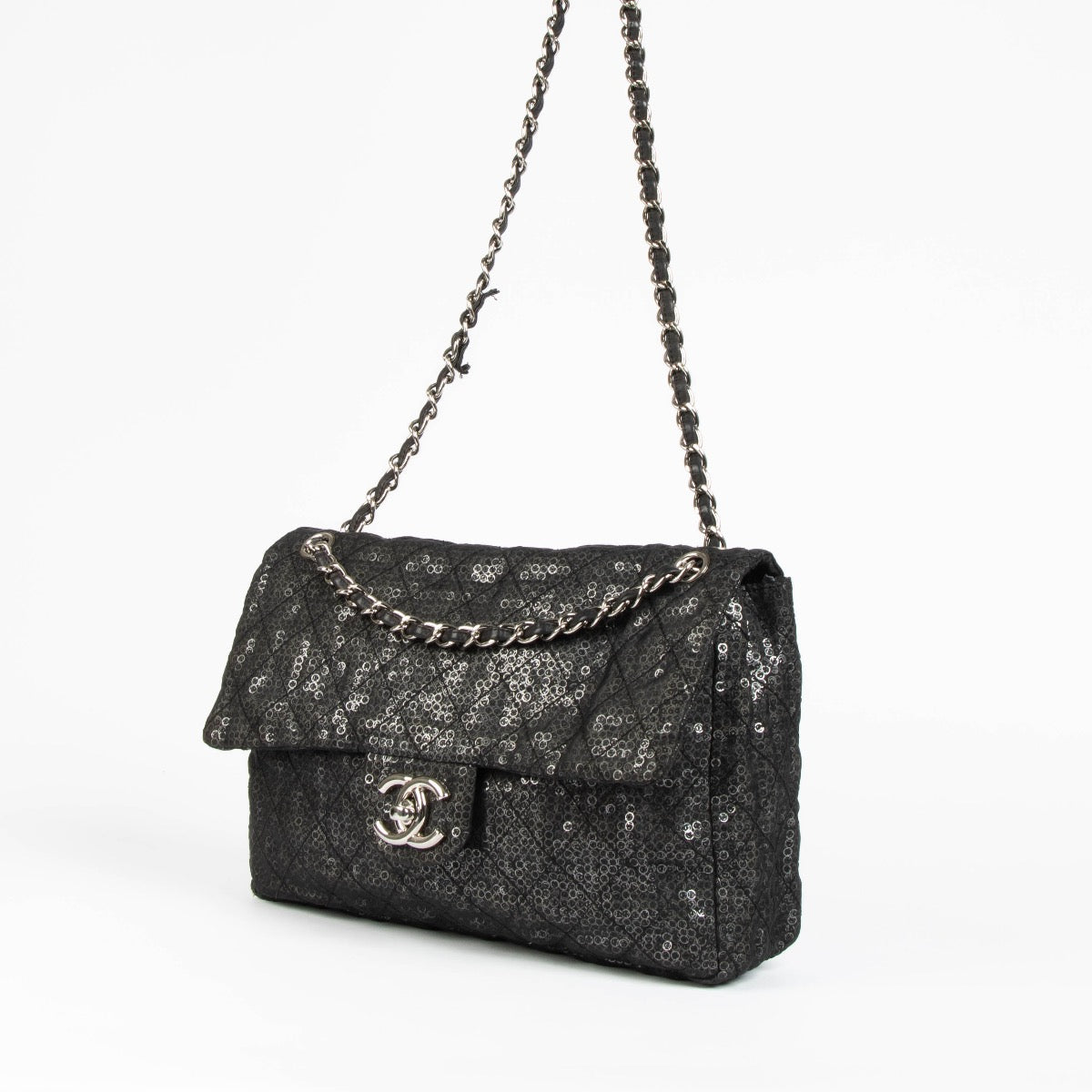 Shop this authentic Chanel Black Sequin Mesh Large Flap Bag pre-loved on Labellov.com