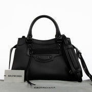 Balenciaga Black Neo Classic City Bag in black leather – iconic structured designer handbag with signature studs, top handles, and a detachable strap for timeless, versatile luxury.