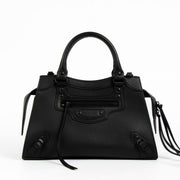 Balenciaga Black Neo Classic City Bag in black leather – iconic structured designer handbag with signature studs, top handles, and a detachable strap for timeless, versatile luxury.