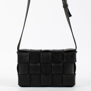 Authentic pre-loved Bottega Veneta Black Cassette Bag on Labellov.com