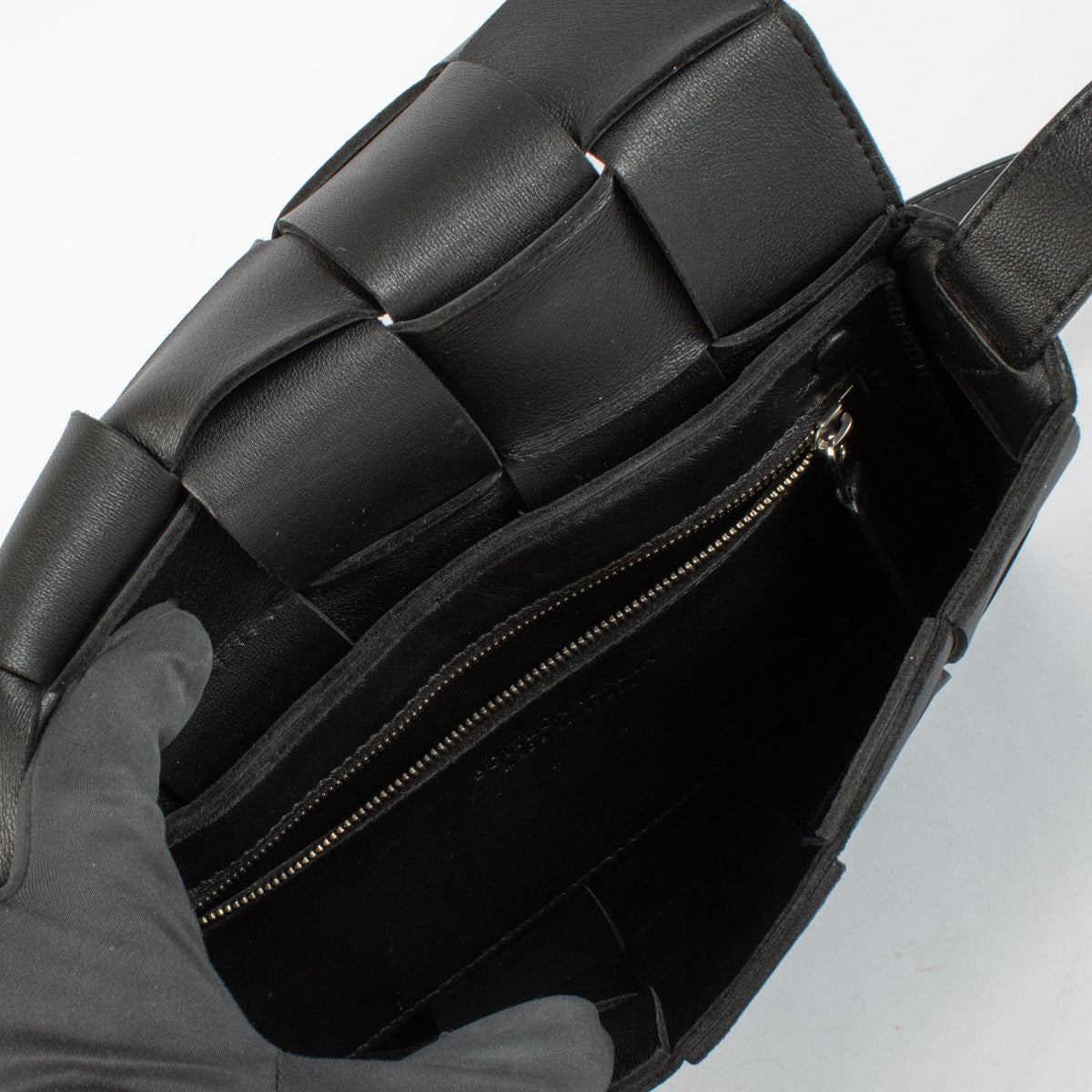 Authentic pre-loved Bottega Veneta Black Cassette Bag on Labellov.com
