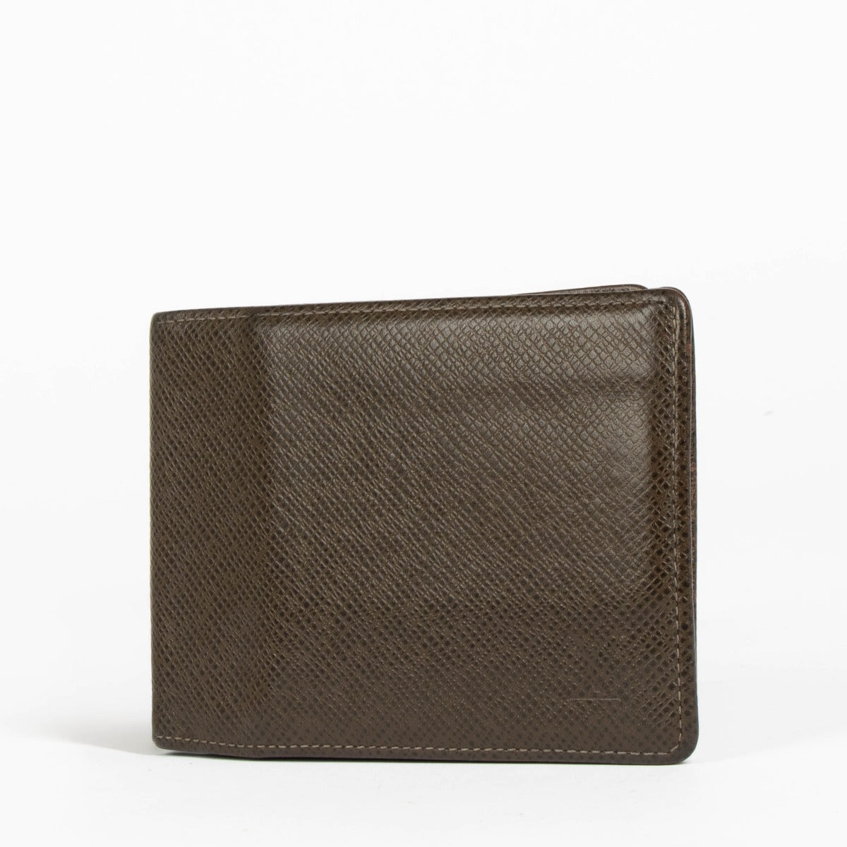 Authentic pre-loved Louis Vuitton Taiga Leather Bifold Wallet on Labellov.com