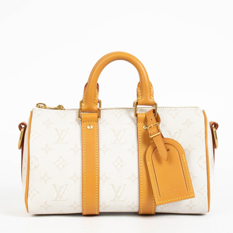 Authentic pre-loved Louis Vuitton Monogram Heritage Keepall Bandouliere 25 on Labellov.com
