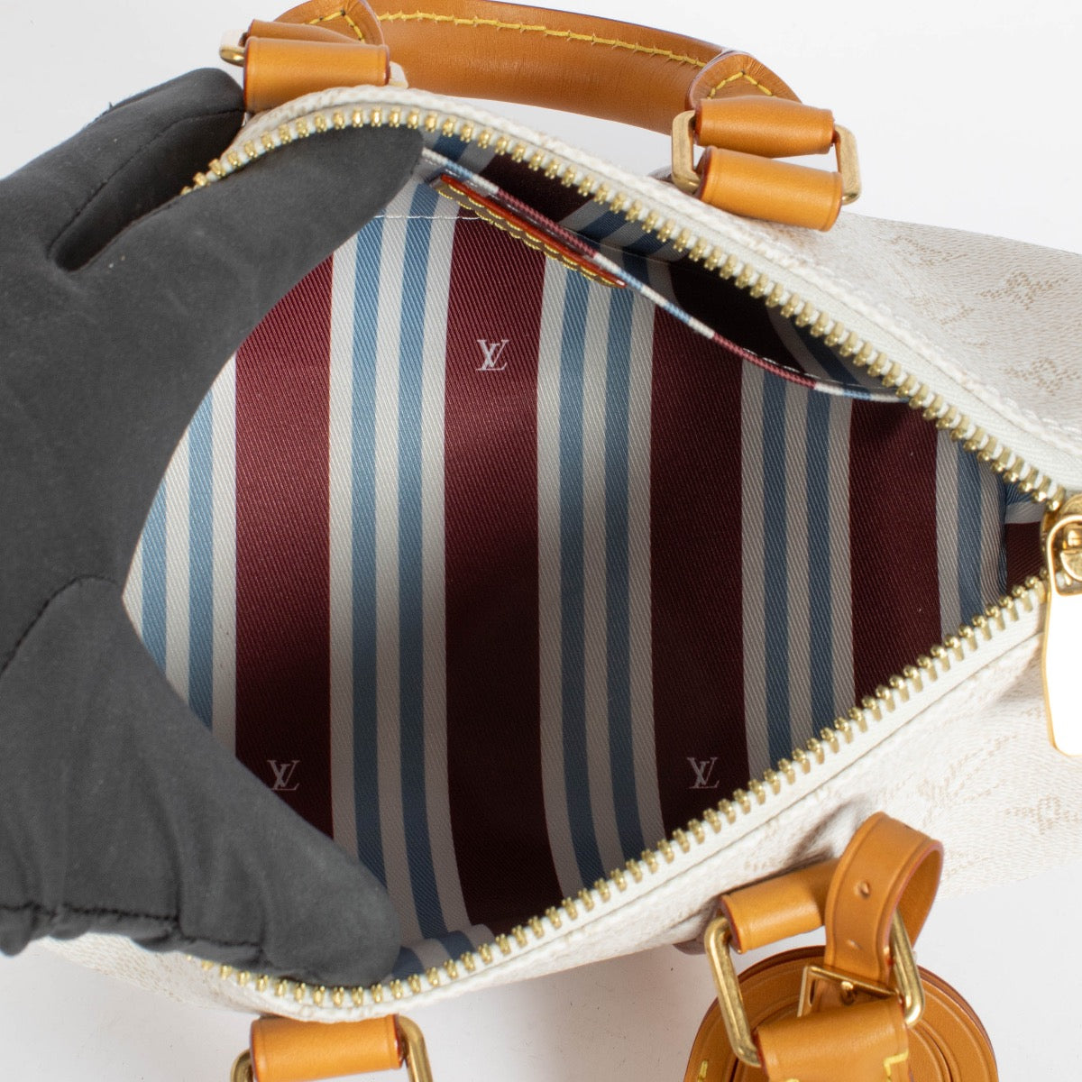 Authentic pre-loved Louis Vuitton Monogram Heritage Keepall Bandouliere 25 on Labellov.com
