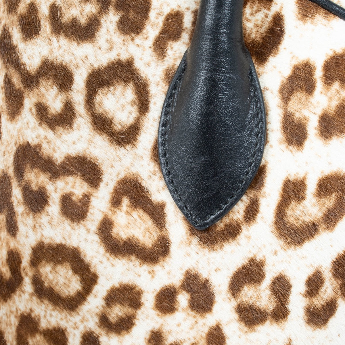 Authentic pre-loved Alaïa Leopard Print Calf Hair Satchel Bag on Labellov.com