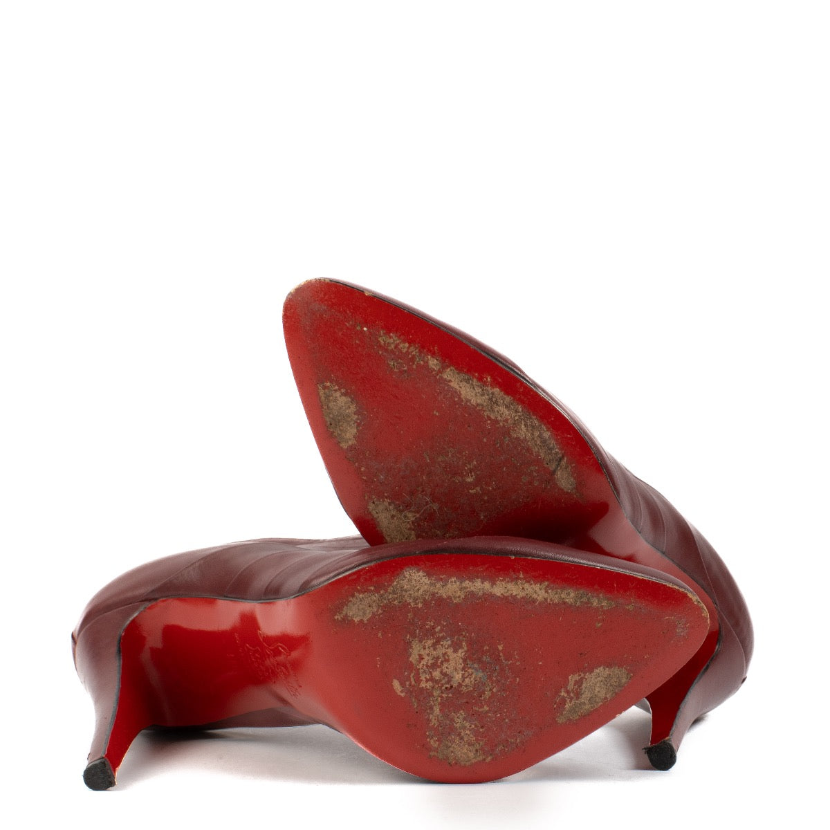 Shop safe online at Labellov in Antwerp, Brussels and Knokke these 100% authentic second hand Christian Louboutin Burgundy Ankle Boots - size 40