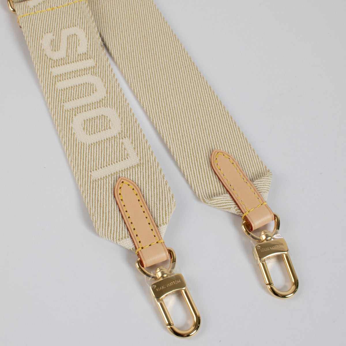 Shop 100% authentic second hand Louis Vuitton Beige High Rise Strap on Labellov.com