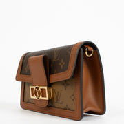 Shop the authentic Louis Vuitton Monogram Mini Dauphine Crossbody Bag at Labellov.com.