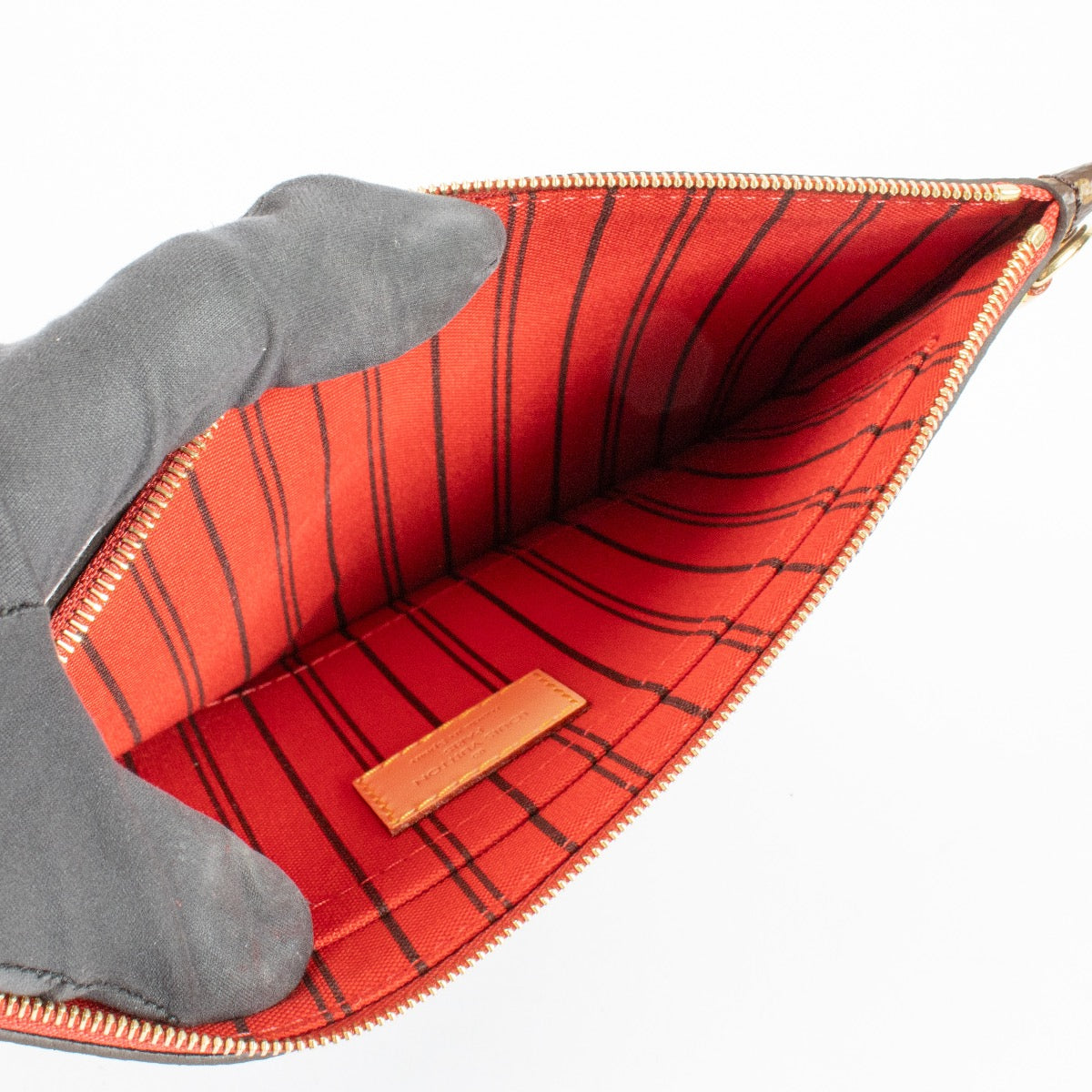 Shop the authentic Louis Vuitton Monogram Neverfull Clutch at Labellov.com.