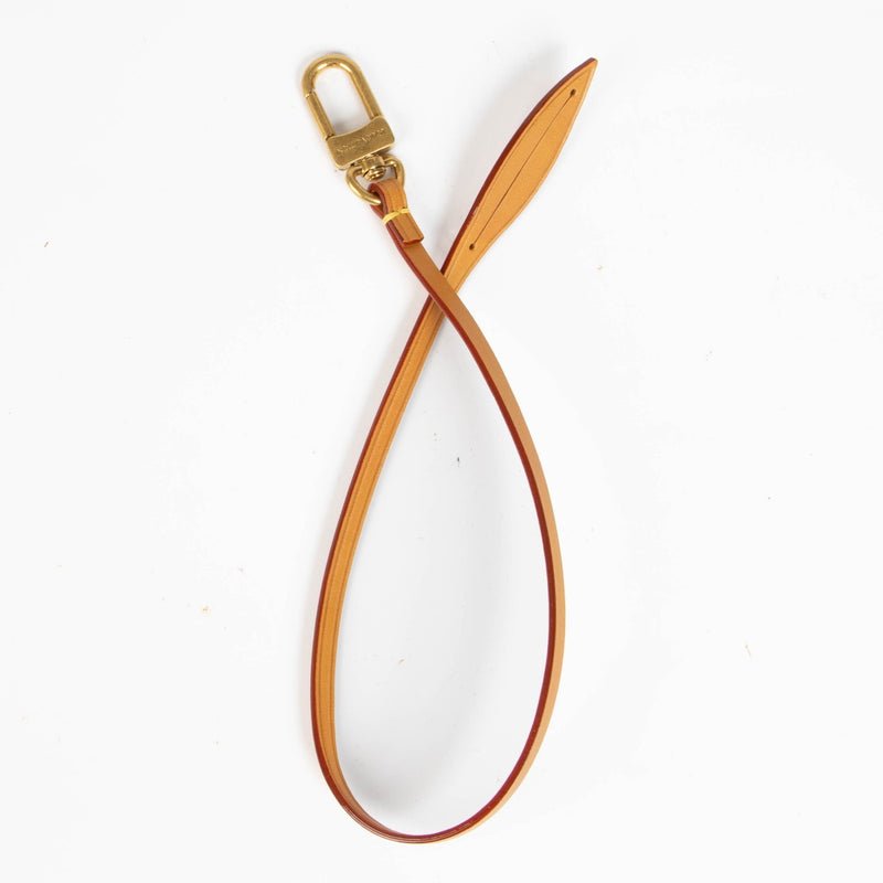 Shop this authentic Louis Vuitton Tag Me Pouch Strap Vachetta pre-loved on Labellov.com
