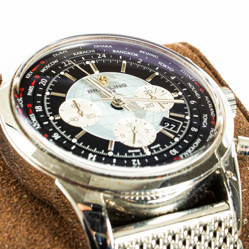 The Breitling Transocean Chronograph is a sophisticated timepiece featuring a 43mm stainless steel case, a sleek black dial, and a transparent case back. It comes complete with original booklets and a certificate of authenticity. Shop now at Labellov.
