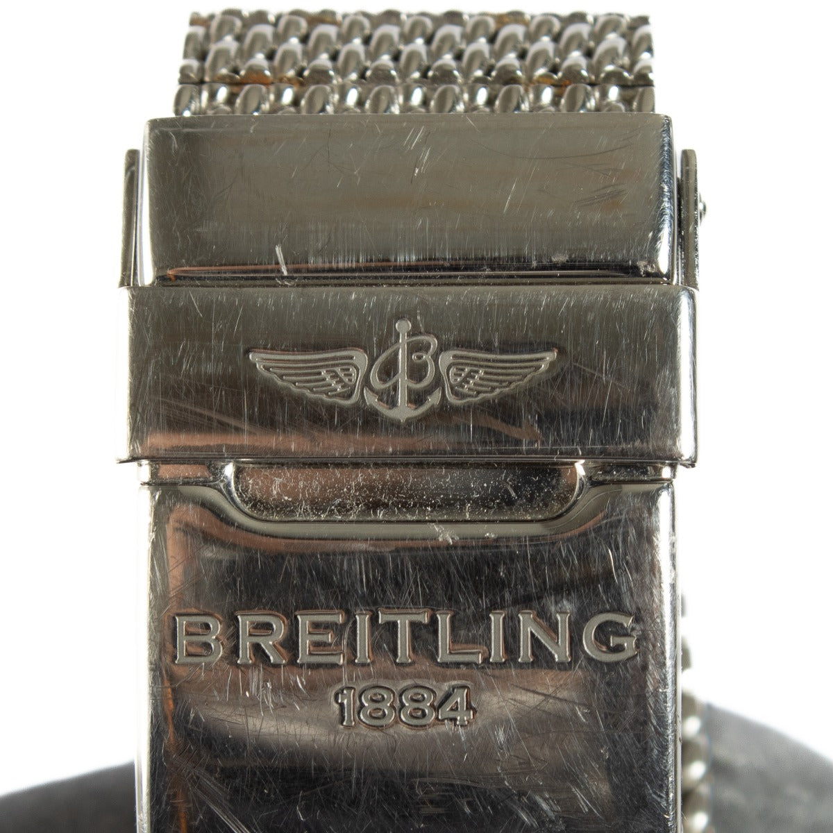 The Breitling Transocean Chronograph is a sophisticated timepiece featuring a 43mm stainless steel case, a sleek black dial, and a transparent case back. It comes complete with original booklets and a certificate of authenticity. Shop now at Labellov.