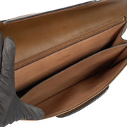 shop 100% authentic second hand Delvaux Brown Toile De Cuir Clutch on Labellov.com
