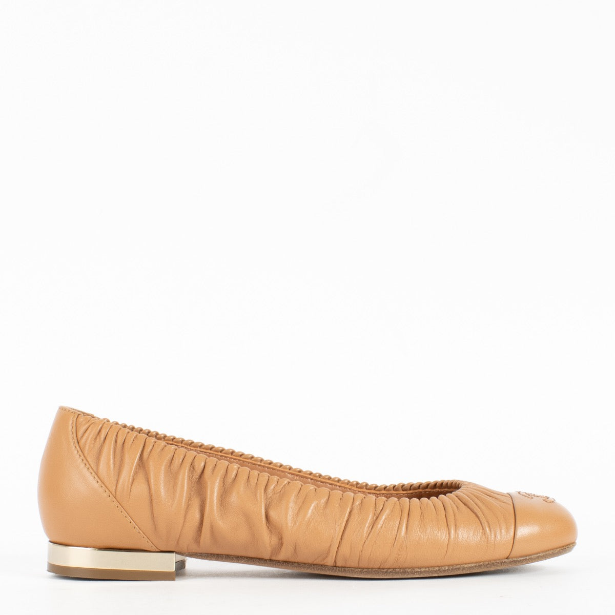Shop Chanel Pink Ballerina Flats in size 37.5 at Labellov.com. Soft leather, ruched sides, iconic CC toe detail, and elegant metallic heel accent. Very good condition.