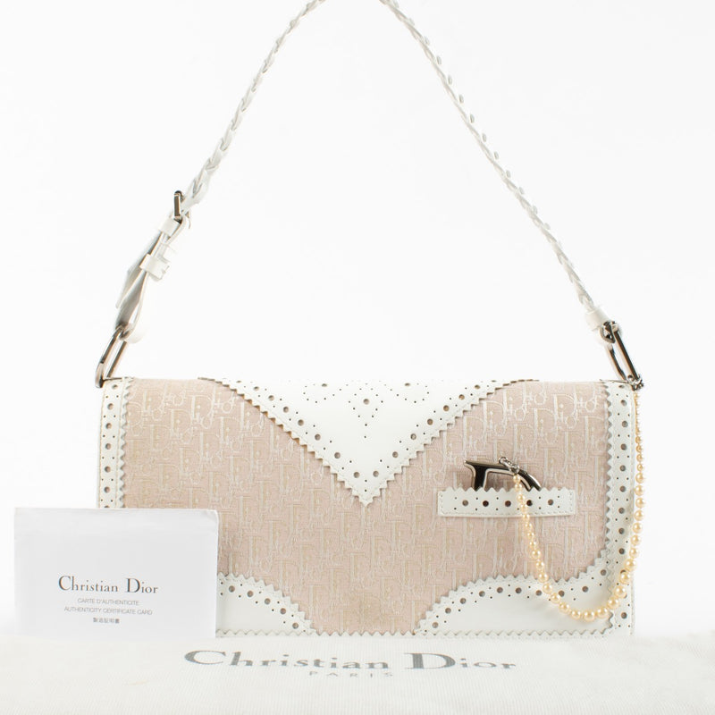 Authentic Second Hand Christian Dior Pink DTrick Shoulder Bag on Labellov.com