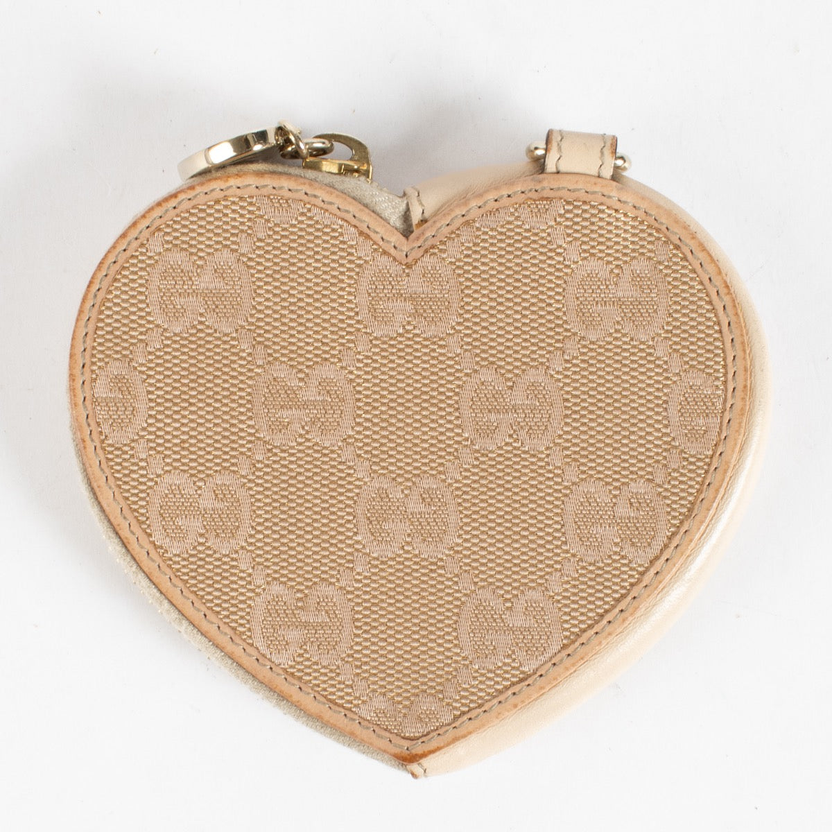 Discover the Gucci Beige GG Supreme Heart Coin Purse at Labellov.com. Cute, compact and elegant—perfect as a mini wallet or bag charm. Shop authenticated luxury.