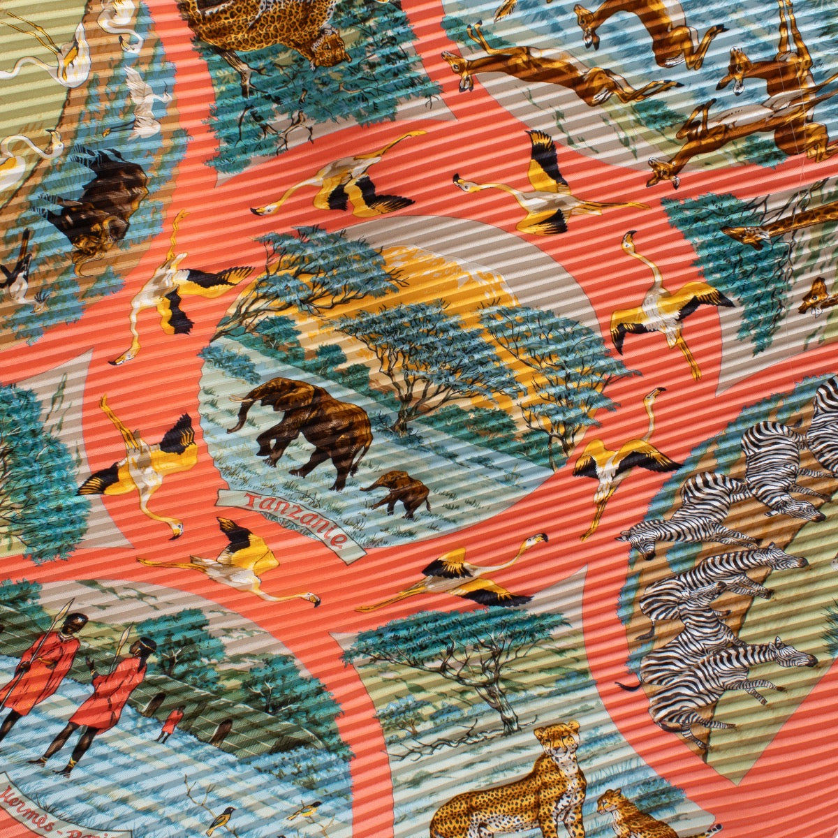 Shop safe online at Labellov in Antwerp, Brussels and Knokke this 100% authentic second hand Hermès Pink Tanzania Silk Plissé Scarf. Veilig online tweedehands authentiek Hermès Pink Tanzania Silk Plissé Sjaal kopen bij Labellov.