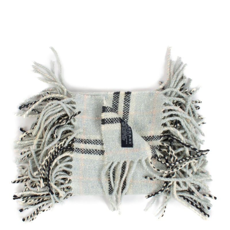 Burberry Baby Blue Check Scarf made from a blend of merino wool, angora, and cashmere, featuring the iconic check pattern in a soft baby blue color. Shop now on Labellov.com.