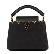 Shop safe online at Labellov in Antwerp, Brussels and Knokke this 100% authentic second hand Louis Vuitton Black Taurillon Mini Capucines. Veilig online tweedehands authentieke Louis Vuitton Black Taurillon Mini Capucines handtas kopen bij Labellov.