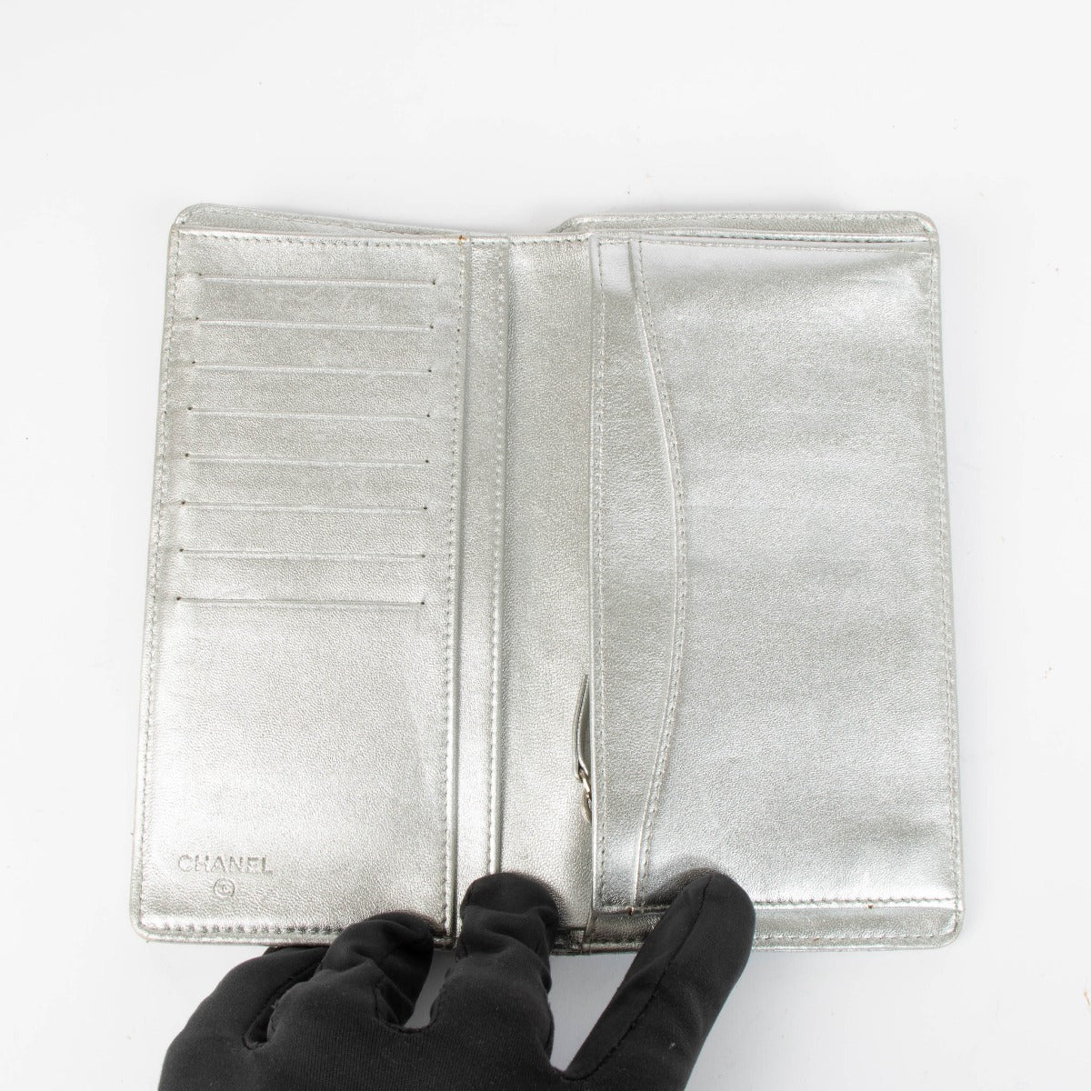 Shop this 100% authentic Chanel Silver Lambskin Quilted Long Wallet at labellov.com